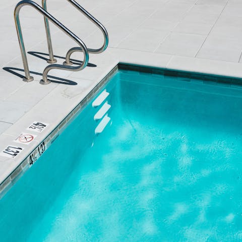 Enjoy a post-work swim in the shared on-site pool