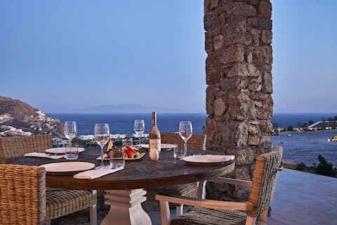 Enjoy an alfresco meal as the sparkling sea stretches out before you
