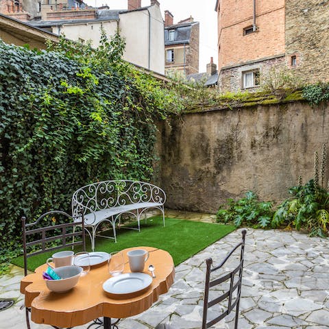 Start mornings with fresh coffee and croissants in the private courtyard garden