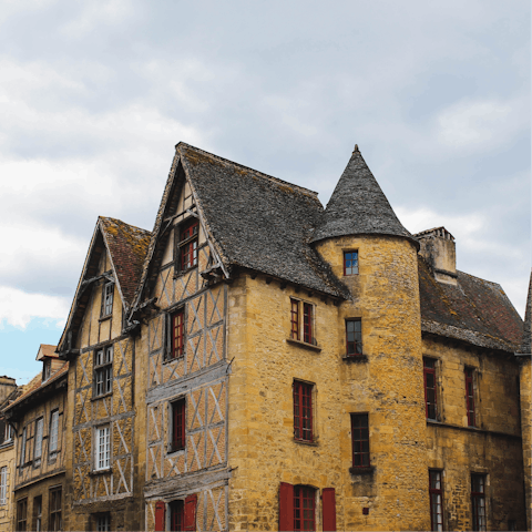 Visit the charming medieval town of Sarlat-la-Canéda, a thirty-minute drive away