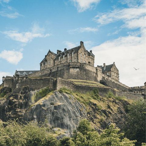 Visit Edinburgh Castle, a twelve-minute stroll from your door