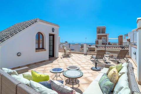 Soak up sea views from the bright roof terrace, ideal for sunset-watching