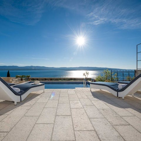 Drink in the fabulous Adriatic view from the comfort of a lounger