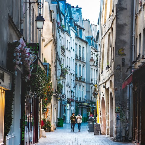 Go out and explore your Marais neighbourhood packed full of colourful shops and cosy cafés 