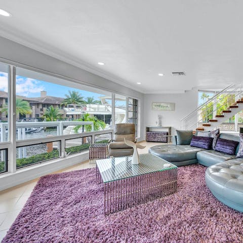 Enjoy plenty of natural light in the mid-century styled living room