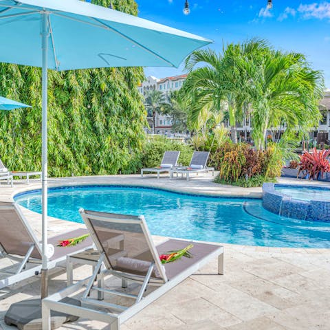 Head to the shared pool for a cooling dip or soak in the Jacuzzi