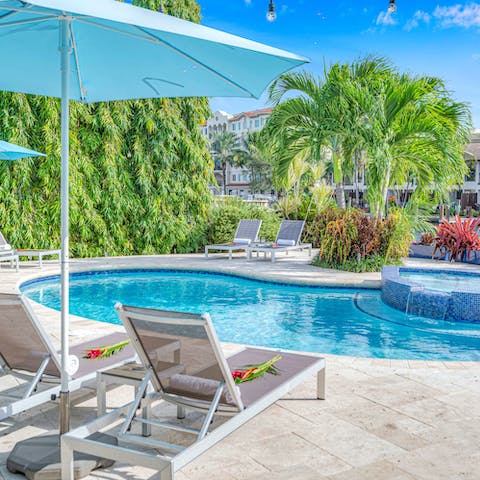 Head to the shared pool for a cooling dip or soak in the Jacuzzi