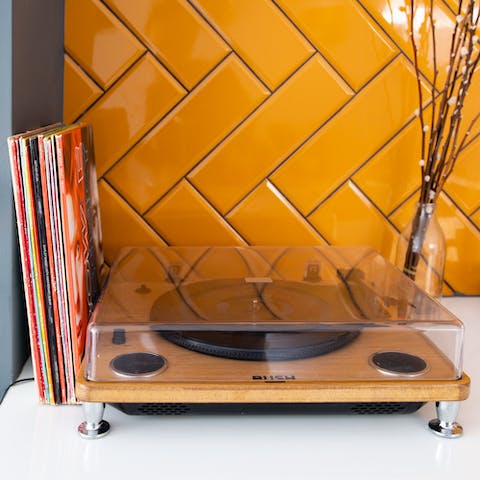 Play some smooth tunes on the record player