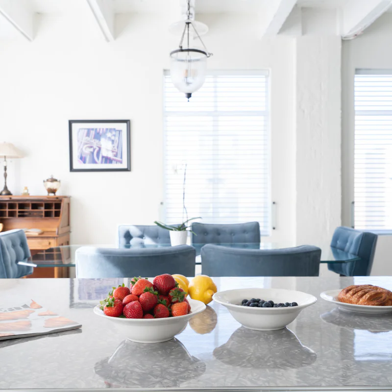 The wide marble kitchen island