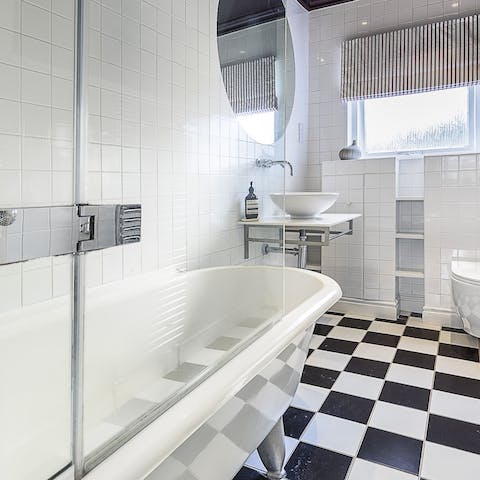 Monochrome bathroom with freestanding bath