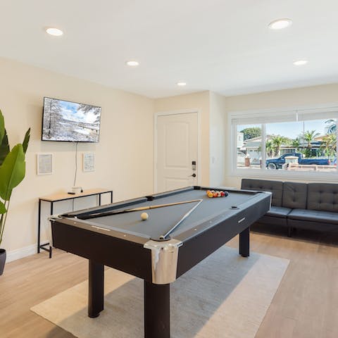 Play a friendly frame or two of pool in the front room