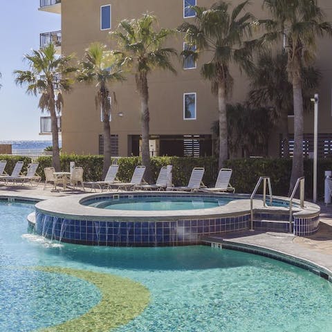 Take a dip in the hot tub or splash about in the three communal pools