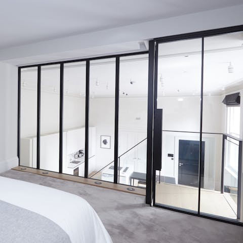Get a restful night's sleep in the modern mezzanine bedroom  