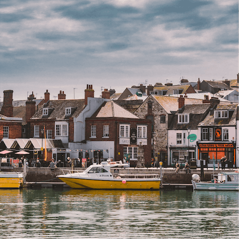 Explore Weymouth's historic harbour – a six-minute stroll away – or sprawl out on the sandy beach, just sixteen minutes on foot