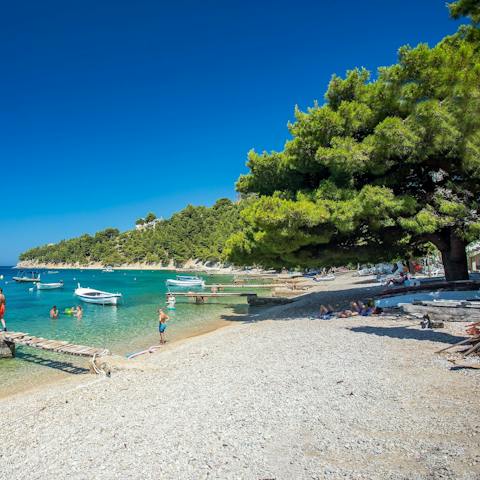 Arrive at stretches of beach and hidden coves in less than twenty minutes by car