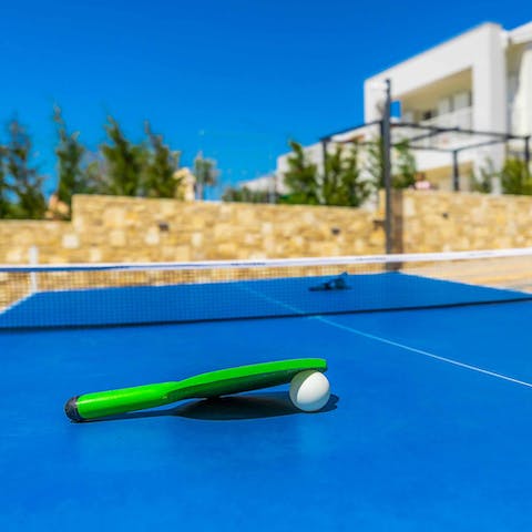 Get competitive with a game of ping-pong, pool or table football