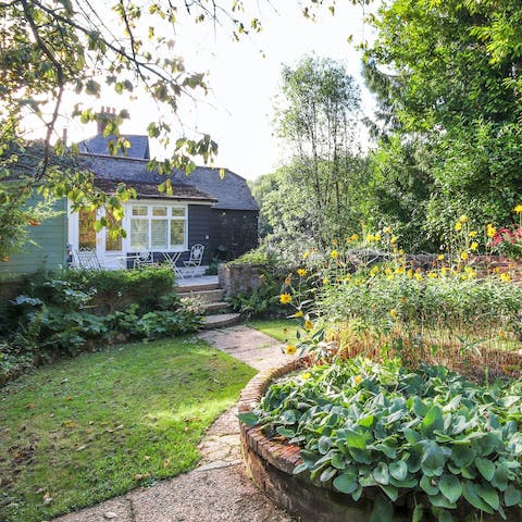 Unwind in the enclosed cottage garden – it's a lovely spot for early-evening cocktails