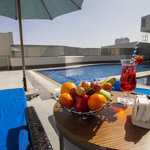 Cool off from the Dubai sun in the communal swimming pool 