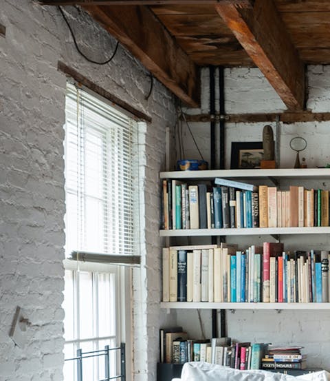 Shelves full of books and games