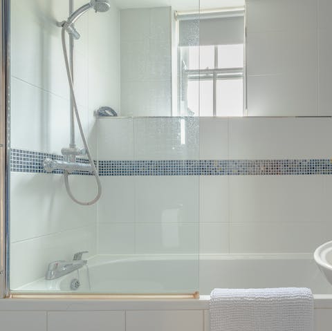 Treat yourself to a rejuvenating soak in the apartment's bathtub