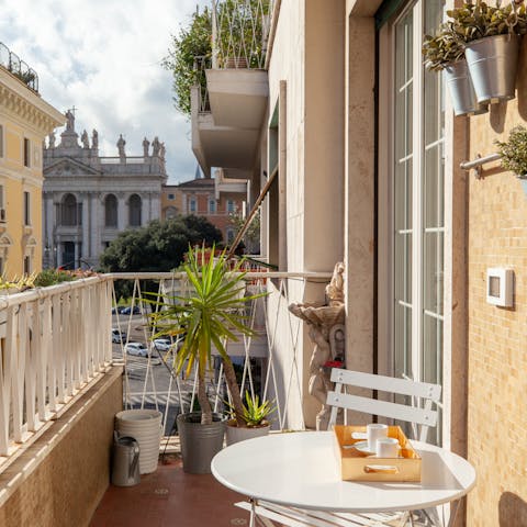 Idle away the summer evenings with views of the San Giovanni in Laterano on your balcony