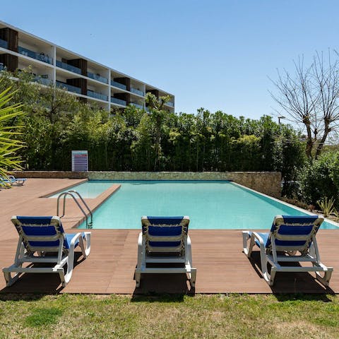 Enjoy a refreshing swim in the communal pool