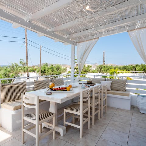 Serve up a wholesome brunch on the stylish covered terrace in the morning