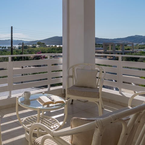 Step out from the bedroom to sip a glass of local wine on your private balcony 