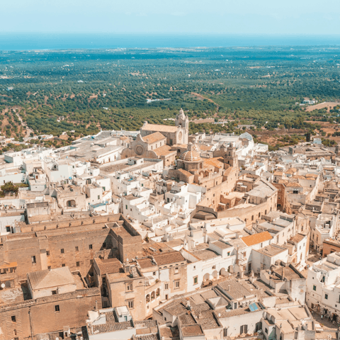 Make the ten-minute drive to Ostuni and do some sightseeing