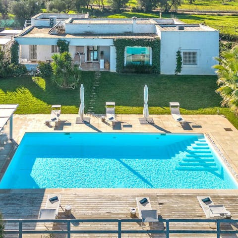 Spend the afternoon lounging in the private pool