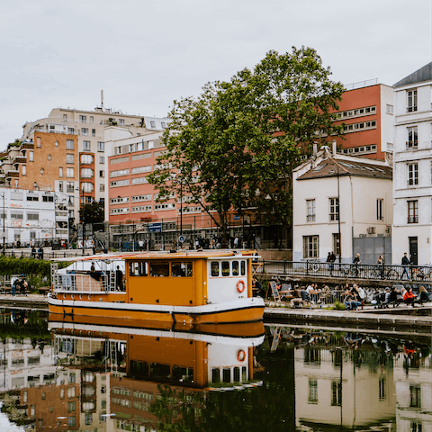 Have a romantic stroll along Canal Saint-Martin, a two-minute walk away 