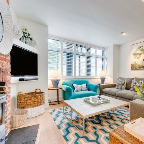 Snuggle up in the comfy living room for an evening of movies by the fire