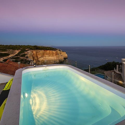 Unwind in the pool with a fantastic view of the coastline