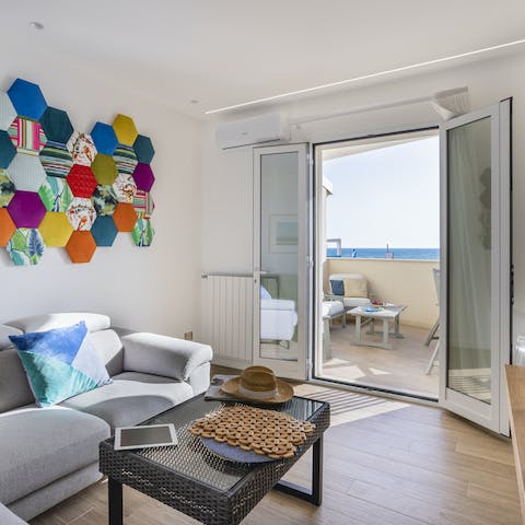 Enjoy instant access to ocean views through your lounge patio doors