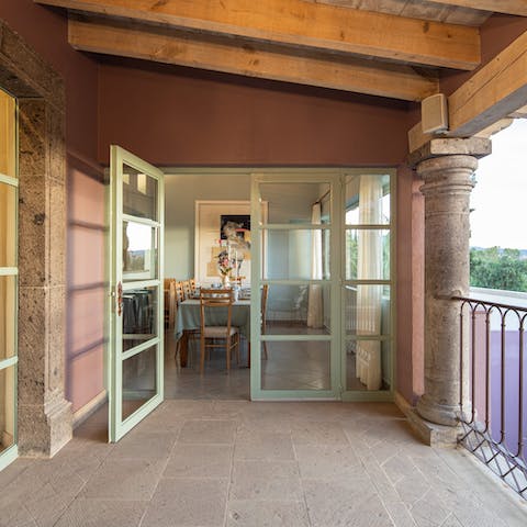 Dine with the balcony doors open so you can enjoy the fresh air as you eat