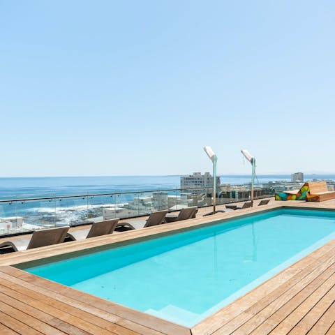 Admire the ocean views from the communal pool deck