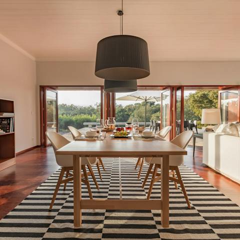 Dine in the sunny open-plan living space