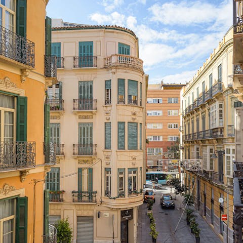 Step out onto the Juliet balcony and admire the grand buildings of your neighbourhood