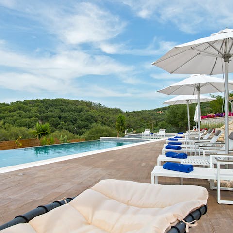 Admire the scenery whilst soaking up the sun by the pool 