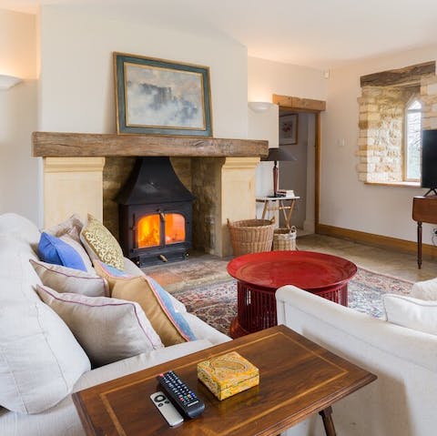 Sink into the comfortable sofas to warm up by the fire