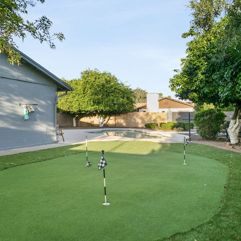 Practise your putting skills on the custom-made green