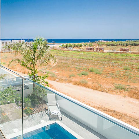 Take in the vistas over sea from the balcony