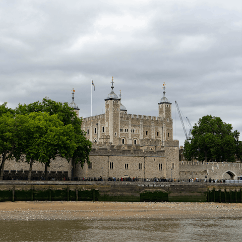Pay a visit to the historic and majestic Tower of London by the river
