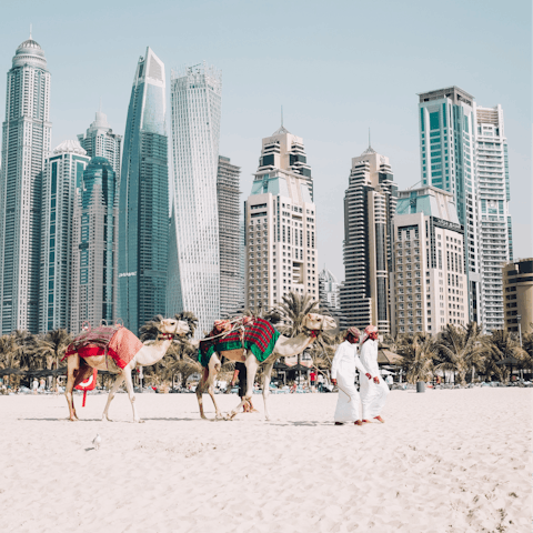 Make the most of any downtime and head for Dubai's white sand beaches
