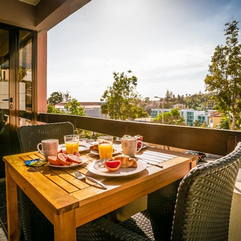 Enjoy alfresco meals on the covered balcony 