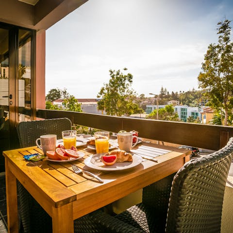 Enjoy alfresco meals on the covered balcony