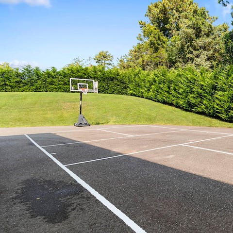 Burn off some energy on the private basketball court by shooting hoops