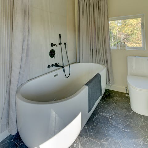 Sink into a hot bath in the en-suite's large standalone tub