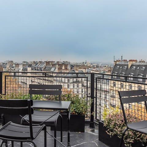 Take in the awe-inspiring sights of Paris from your private terrace