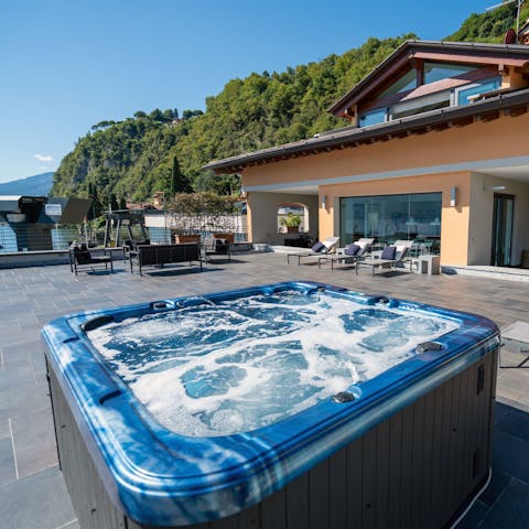 Relax in the private Jacuzzi with a glass of wine